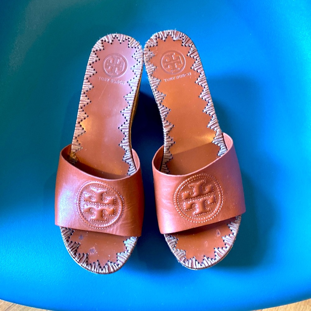 Classic Tory Burch wooded wedge slip on heel. Worn, yet still in lovely shape.